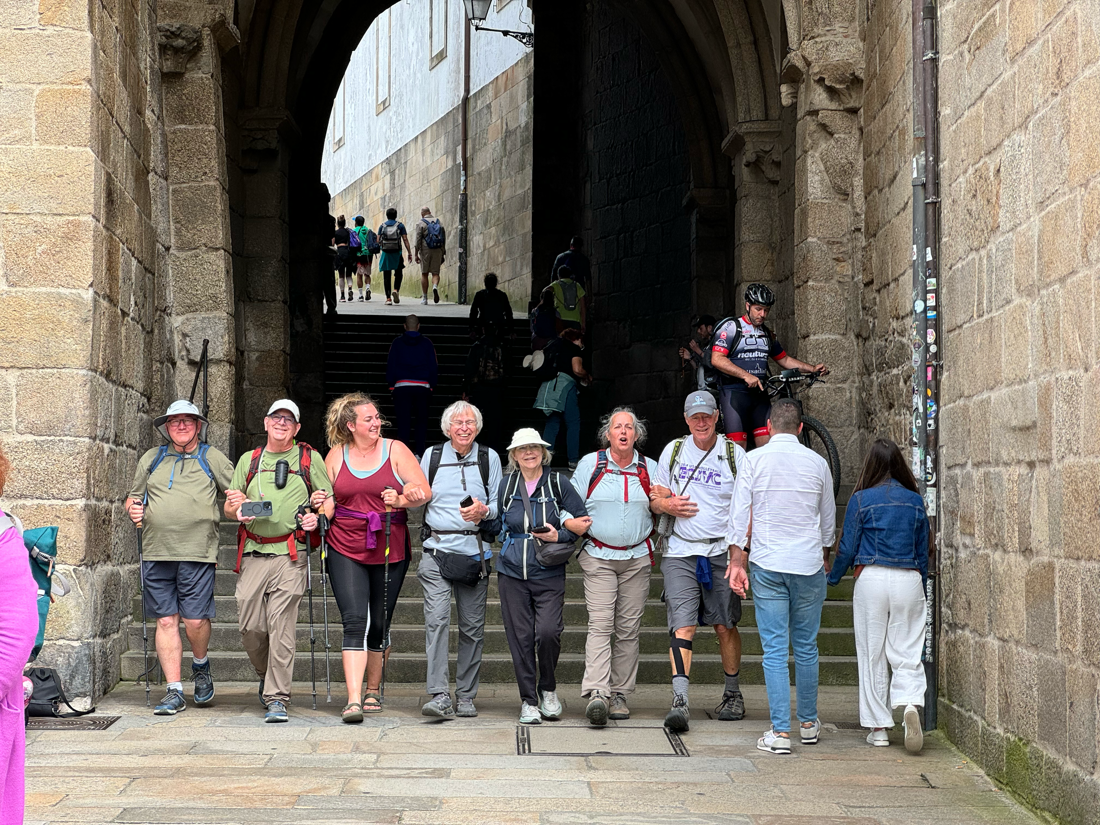 group finishing the Camino de Santiago pilgrimage